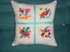 Embroidery cushion by Signe (62K)